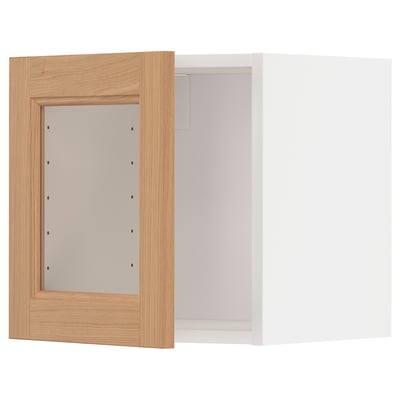 Open METOD kitchen cabinet with oak frame, hinges on side, glass back.