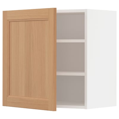 A METOD kitchen cabinet with a light brown wood door, featuring a modern design with an adjustable shelf and sturdy frame construction.