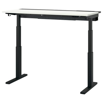 This image displays a MITTZON sit-stand desk in white with black legs. The design includes adjustable height with dual motors for ergonomic comfort.