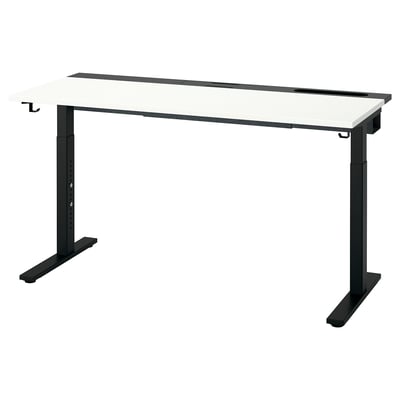 MITTZON height-adjustable desk in white and black, featuring a sleek design with modern metal legs and a spacious, easy-to-clean surface.