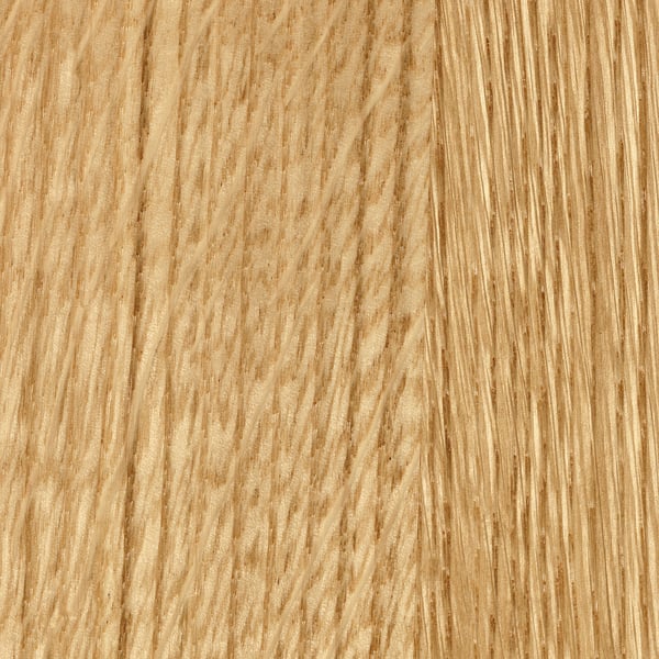 Close-up of natural wood grain texture, showcasing light and smooth finish.