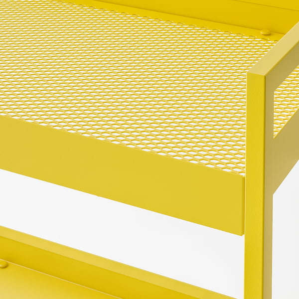 Bright yellow metal shelf with perforated pattern, part of a versatile storage trolley with sturdy build quality.