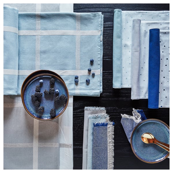 Blue NISSÖGA tablecloth, cotton-jute blend, square shape, textured pattern.