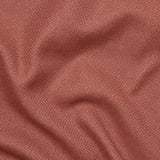 Close-up of textured, two-toned fabric, soft and inviting.