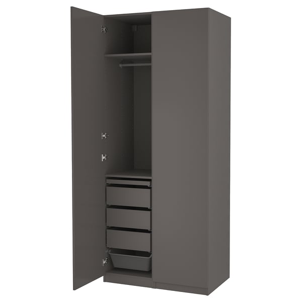 This image shows a modern, dark grey PAX wardrobe with drawers and shelves for storage.