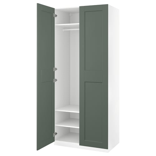 Displays an open green and white PAX wardrobe. The wardrobe has two doors, one shelf, and a clothes rod inside.