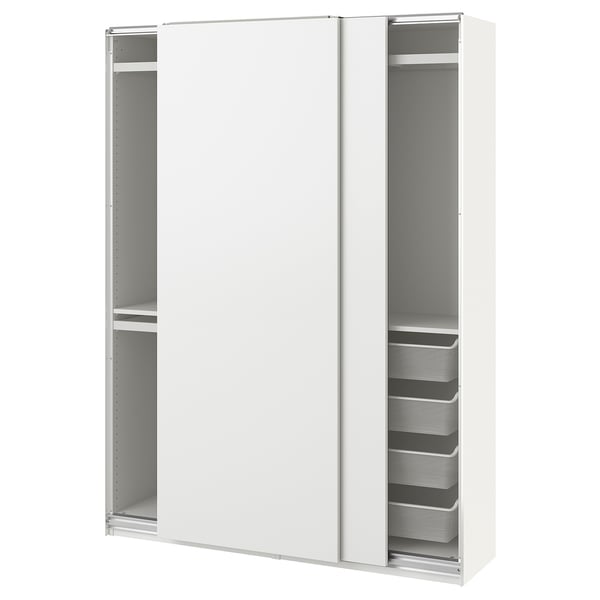 A white PAX wardrobe with sliding doors and storage baskets, ideal for compact spaces.