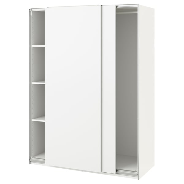 A white ikea PAX wardrobe with sliding doors and inner shelves.