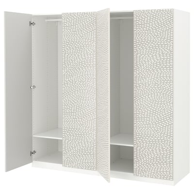 White PAX wardrobe with wavy pattern, three sections, open doors revealing shelves, and soft-close hinges.