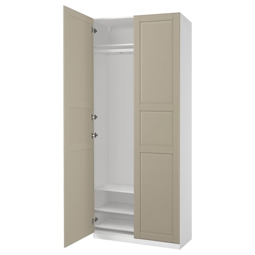 PAX wardrobe: tall, beige, minimalist, beige doors, wooden materials, narrow frame, soft-closing hinges.