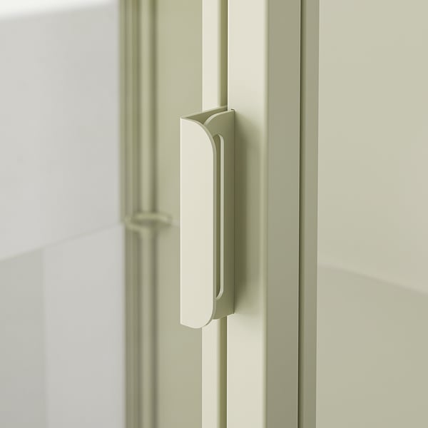 A modern glass-door cabinet with a sleek handle. The cabinet clean lines and a high-quality finish, emphasising its contemporary design.