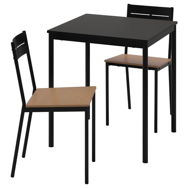 Sandberg set: black metal table, two wooden chairs. Sleek, modern design with minimalist lines.