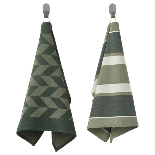 Two green hanging towels: one with geometric patterns, one striped. Made from cotton and jute, ideal for kitchen use.