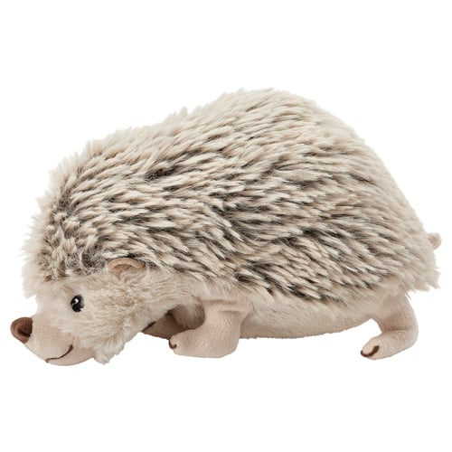 Cuddly toy hedgehog, tan, black spots, round body, soft, smiley face.