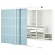 Modern white and blue wardrobe with sliding doors; four shelves, wire baskets, and drawers.