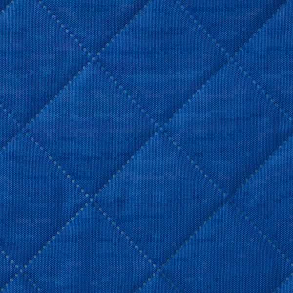 Close-up of blue quilted fabric, showcasing detailed stitching pattern. Soft, durable material.