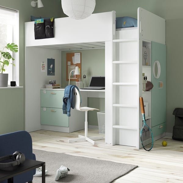White SMÅSTAD loft bed combo in green room, includes bed, desk, wardrobe, and bookcase.