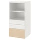 White SMÅSTAD bookcase with shelves and wooden drawers.