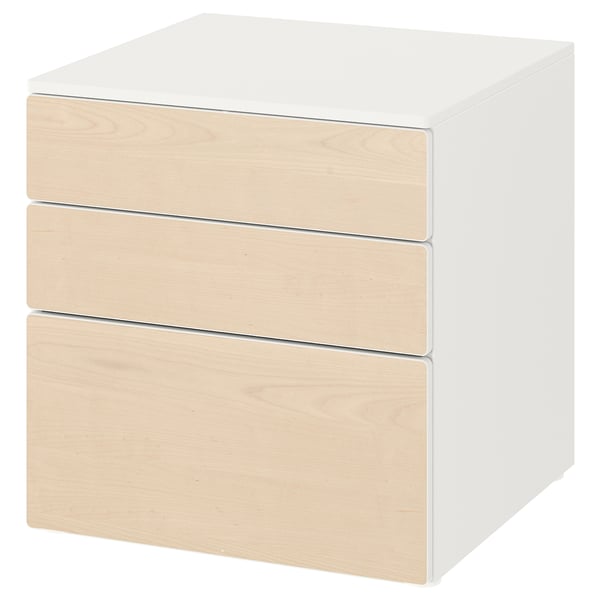 A white SMÅSTAD chest of three light wood drawers, designed for childrens storage.