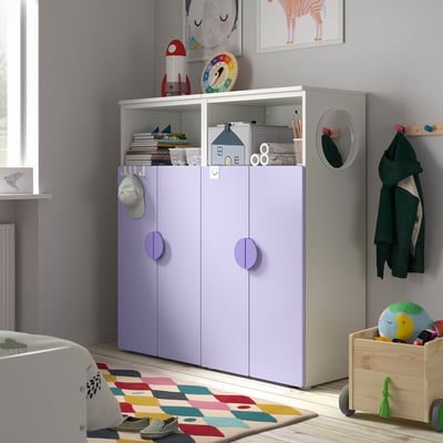 SMÅSTAD storage in kids room with purple doors, organising books, toys, and clothes.