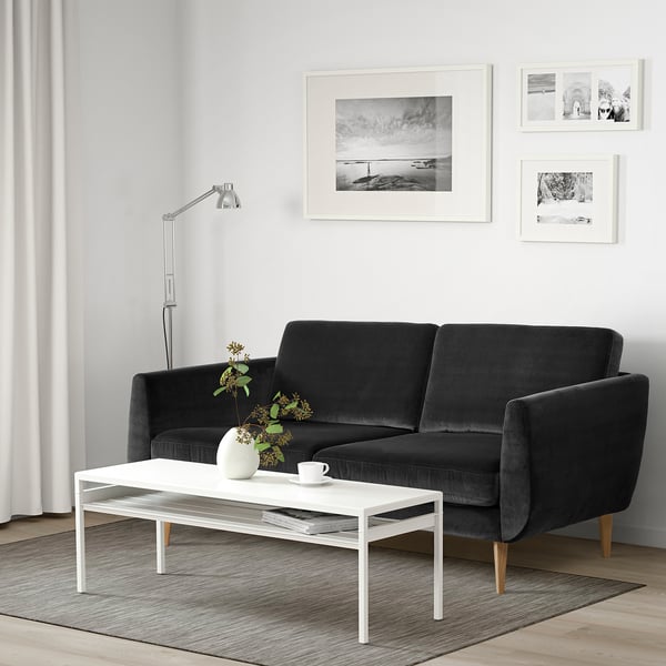 Modern living room with SMEDSTORP sofa, coffee table, and minimalist decor.