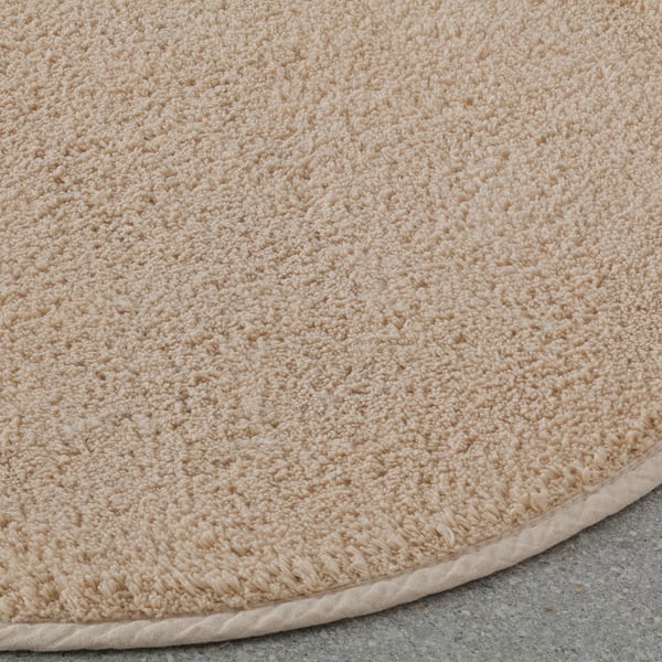SÖDERSJÖN Bath mat, light beige/round, 55 cm