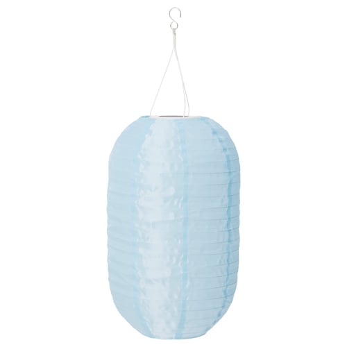 Blue SOLVINDEN solar lantern, made from recycled materials, glows in dark after sun charging.