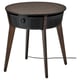A brown ikea STARKVIND table air purifier with wooden legs, a round top, and control panel.