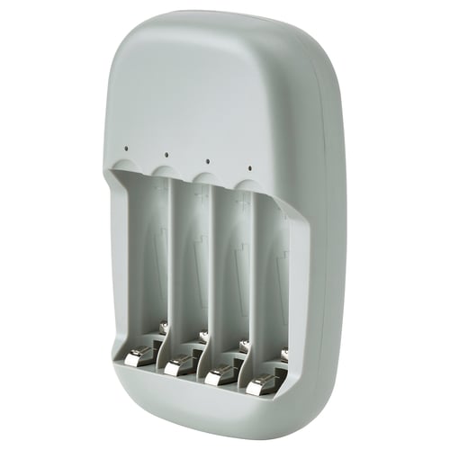 A light grey STENKOL battery charger, rectangular, with four slots for charging batteries.