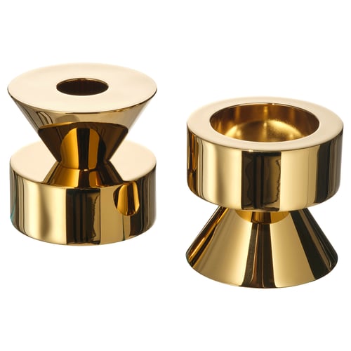 Golden metal candlesticks, reversible design, sturdy, tealights or tall candles, shiny finish.