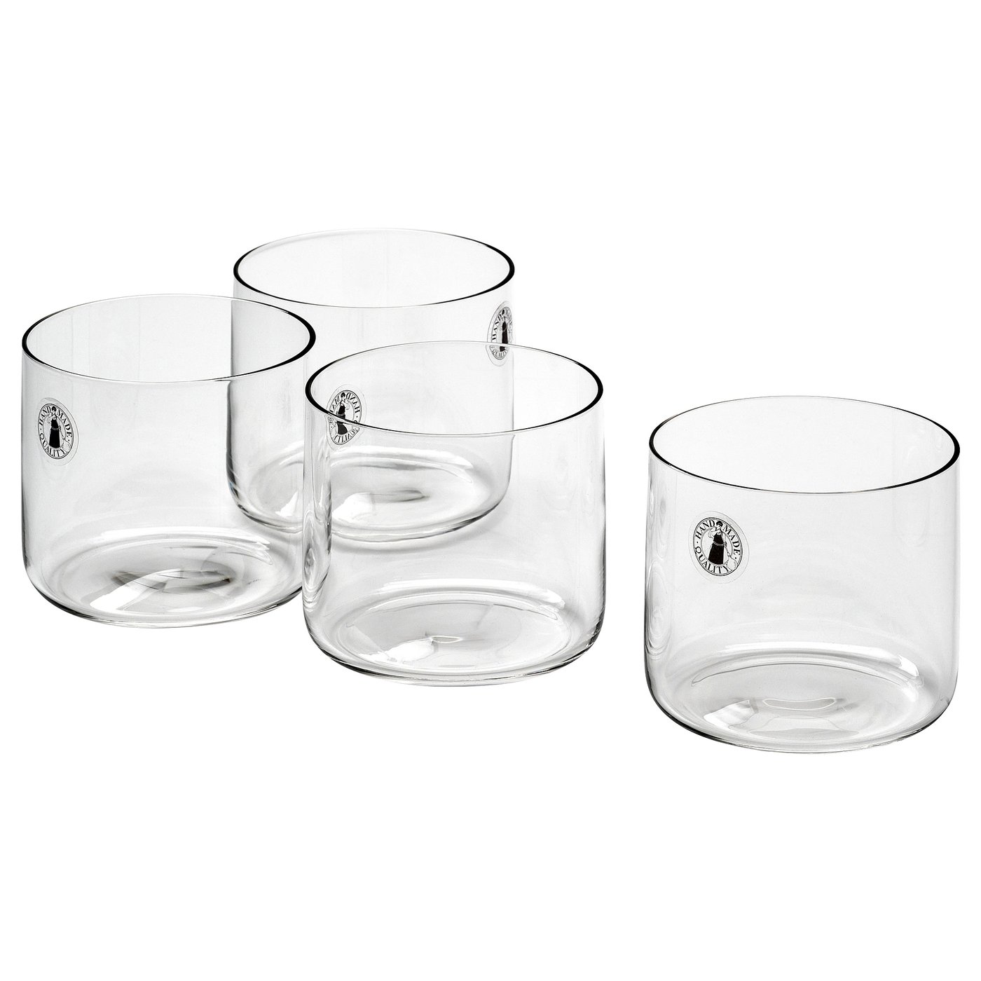 Four transparent STOCKHOLM 2025 glass cups. Mouth-blown, sleek, straight design, clear colour, modern style.