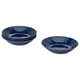 Four deep blue ceramic bowls with simple, clean designs neatly stacked and displayed. Great for elegant dining and versatile decor.