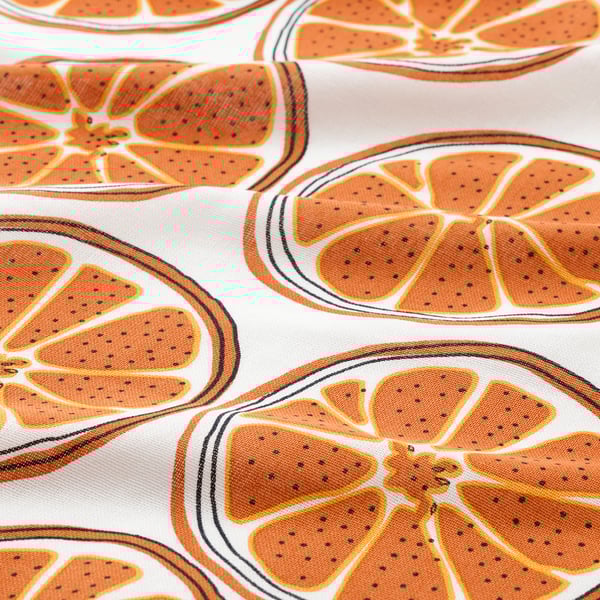 Bright citrus slices on white cloth; vivid, high-quality print.