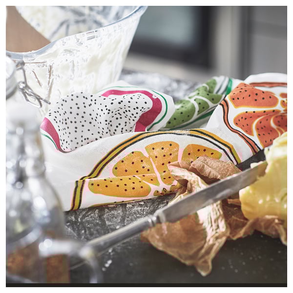 Bright kitchen towel with fruit designs.