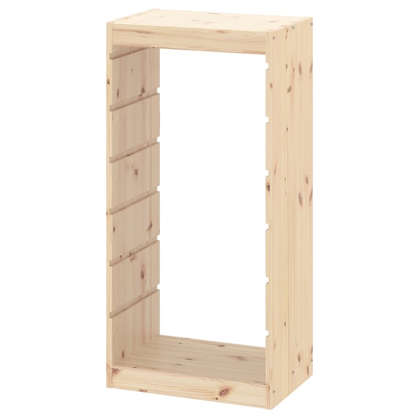 A TROFAST pine wooden storage frame, natural, rectangular, with grooves for adjustable shelves.