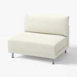 A light beige UPPÅKRA chair with a plush, soft fabric cover and silver metal legs.