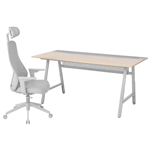 Modern grey home office setup with ergonomic mesh chair and rectangular desk.