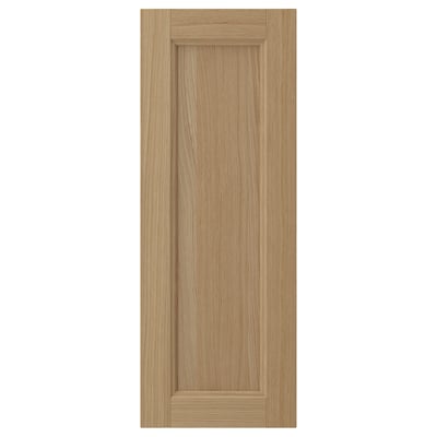 VEDHAMN wooden cabinet door in natural oak, rectangular with simple frame design.