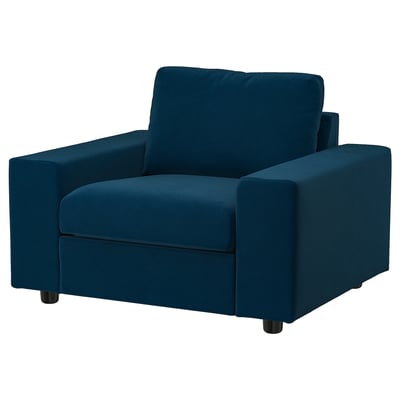 VIMLE armchair, teal. This modern armchair boasts a teal fabric exterior with black legs, featuring a sleek and inviting design for comfort.