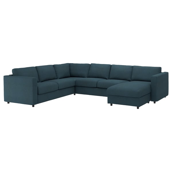 An l-shaped VIMLE sofa in teal with a chaise lounge. It has a modern, clean design with removable, machine-washable covers.