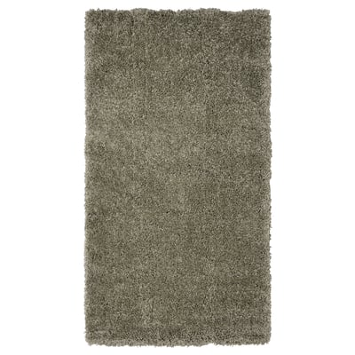 A VOLLERSLEV shaggy area rug in grey, made from recycled polyester and polypropylene, offering a soft, textured surface.