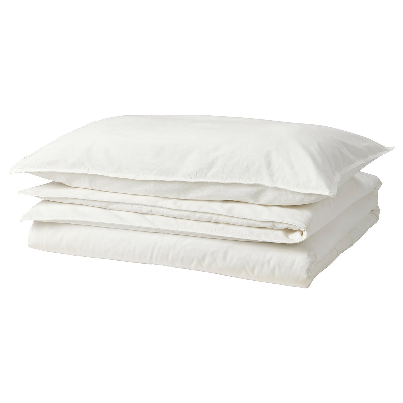 A stack of white ÄNGSLILJA cotton duvet covers and pillowcases, neatly folded. The fabric is soft and has a relaxed, casual design.