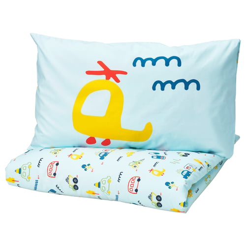 Blue kids pillow, yellow cartoon monster, white clouds, construction vehicles print, soft cotton.