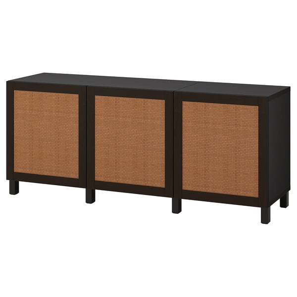 A black BESTÅ sideboard with three large wicker-like brown doors. It is rectangular and has a sleek, modern design.