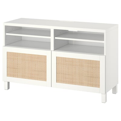 A white BESTÅ tv bench with woven panel doors, rectangular shelves, and square legs.