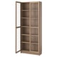 BILLY bookcase: tall, wooden with glass doors, sleek design, adjustable shelves.