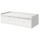 Displays a white BRIMNES day-bed with two drawers, suitable for small spaces. It converts from a sofa to a bed.
