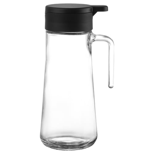 The CELEBRERA is a sleek, transparent glass jug with a black top and stainless steel spout. Perfect for drinks; no leaks when pouring.
