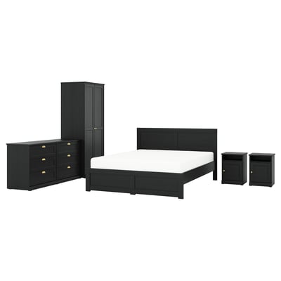 Black furniture set: bed, wardrobe, dresser, 2 nightstands with gold handles, sleek, modern design.