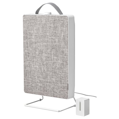A white FÖRNUFTIG air purifier with a fabric front, featuring a handle and a stand, designed for easy portability and modern decor.